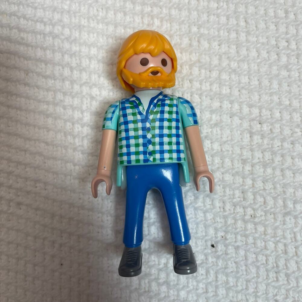 Playmobil man in checkered shirt